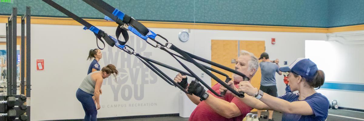 Faculty and Staff working out as a small group