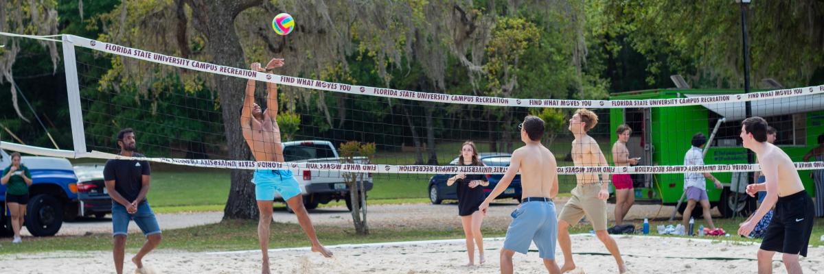 students playing sand volleyball at the Lakefront Park