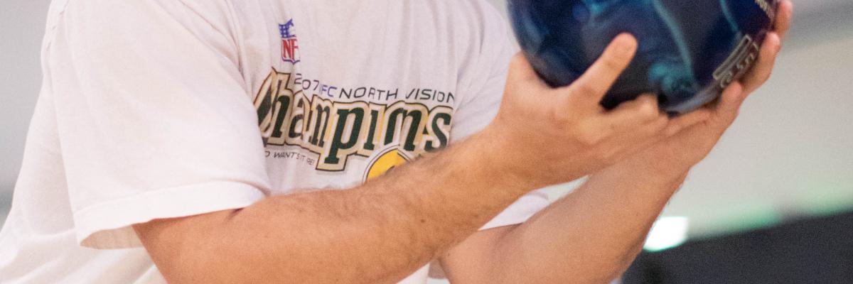 Student bowling during an Intramural Sports bowling league game
