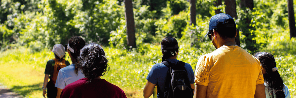 students hiking on an Outdoor Pursuits trip