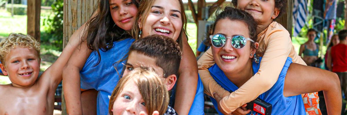 Campers with camp counselors at Camp Flastacowo