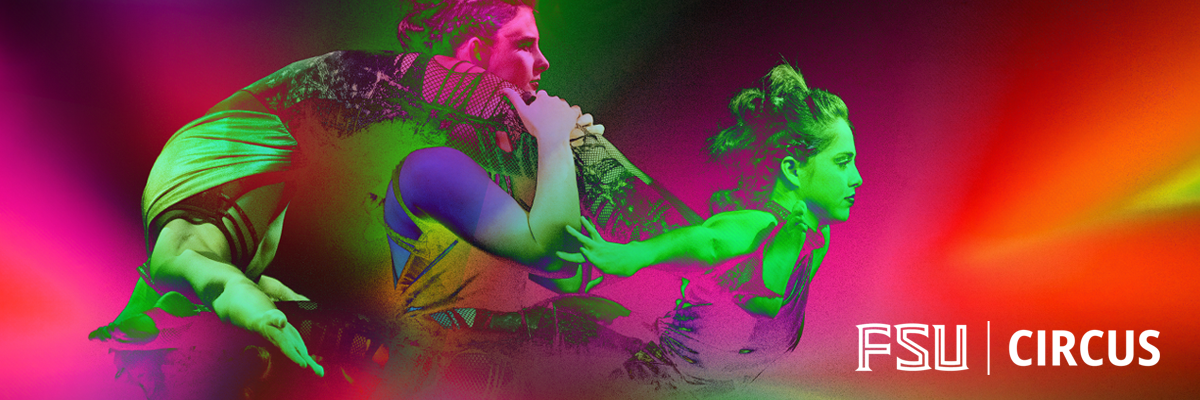 Three students performing Hand Balancing. They are perched atop each other, dressed in apocalyptic themed costumes, and flooded in a colorful rainbow of lights.