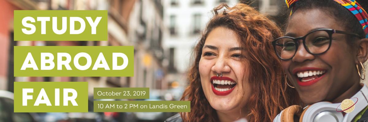 Two students smiling with text that reads Study Abroad Fair October 23, 2019, 10 AM to 2 PM on Landis Green