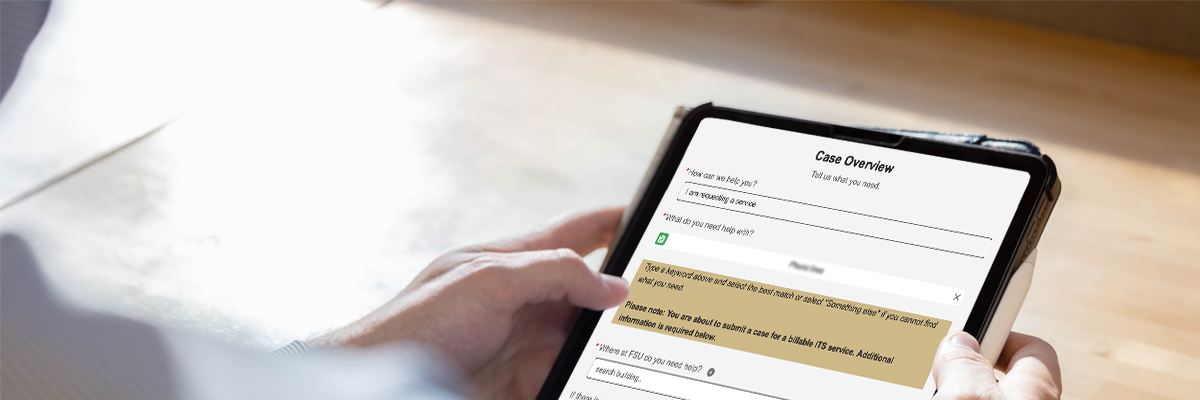 Employee submitting service request form on tablet